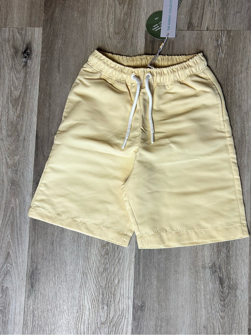 Kid’s Drawstring Swim Shorts in Pale Yellow - Picture 4 of 10